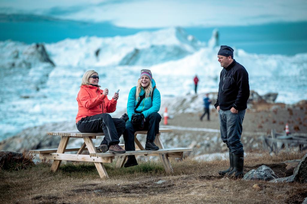 Visitors enjoying East Greenland