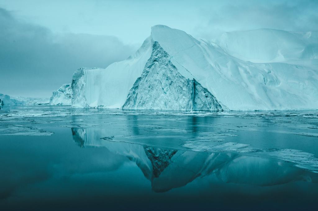 Massive icebergs floating in Disko Bay Greenland