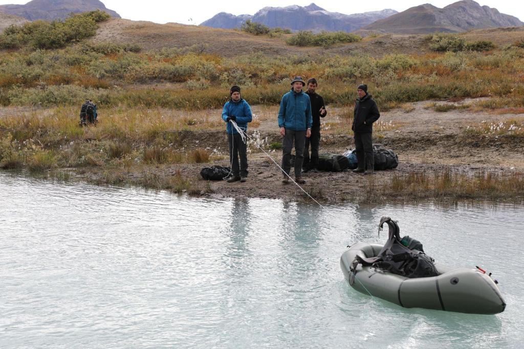 Using a pack raft to transfer gear over the river