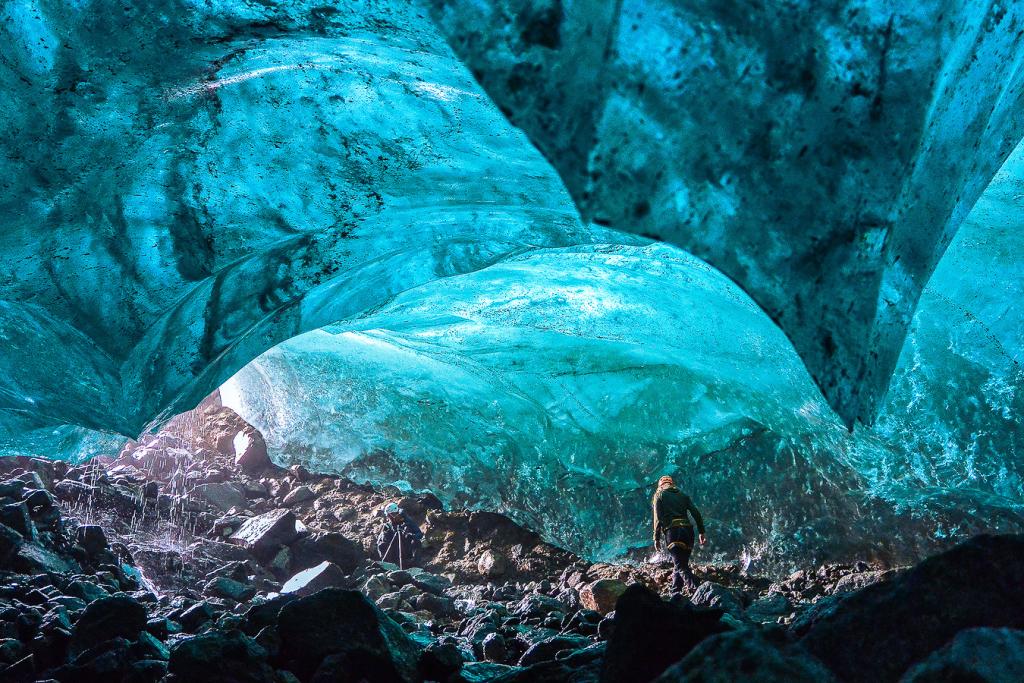 Exploring a beautiful ice cave at Apusiajik Glacier in East Greenland