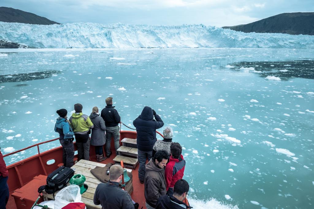 The sightseeing boat approaching Eqi Glacier
