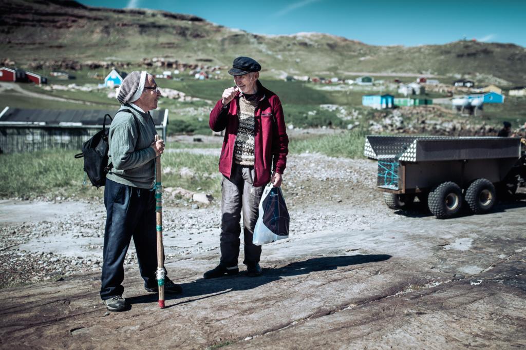 Locals chatting in Igaliku in South Greenland